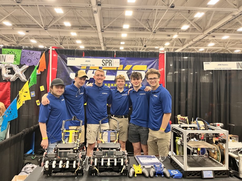 SDSU Robotics Club members, from left, Noah Welsh, Cyrus Nelson, Todd Mueller, Ben Heinze, Ian Brueggeman and Charles Peterson, display the two robots they built for the Vex U World Robotics Competition in Dallas April 28-30. The team concluded a strong season by earning the excellence award and finishing second in the skills competition among the 113 entries.